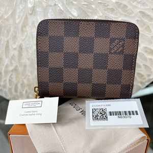 Damier Ebene canvas, the Zippy coin purse.